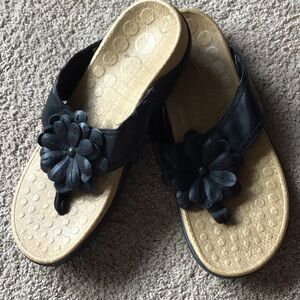 Black and Tan Sandals with Floral Embellishment
